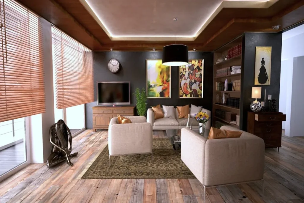 Uma sala de estar moderna e bem decorada com poltronas, sofá, televisão e um amplo espaço, representando a realização do sonho da casa própria através de um consórcio.